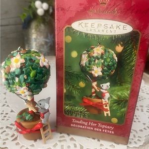🎄 HALLMARK KEEPSAKE ORNAMENT. “TENDING HER TOPIARY”. DATED 2000. RARE & RETIRED
